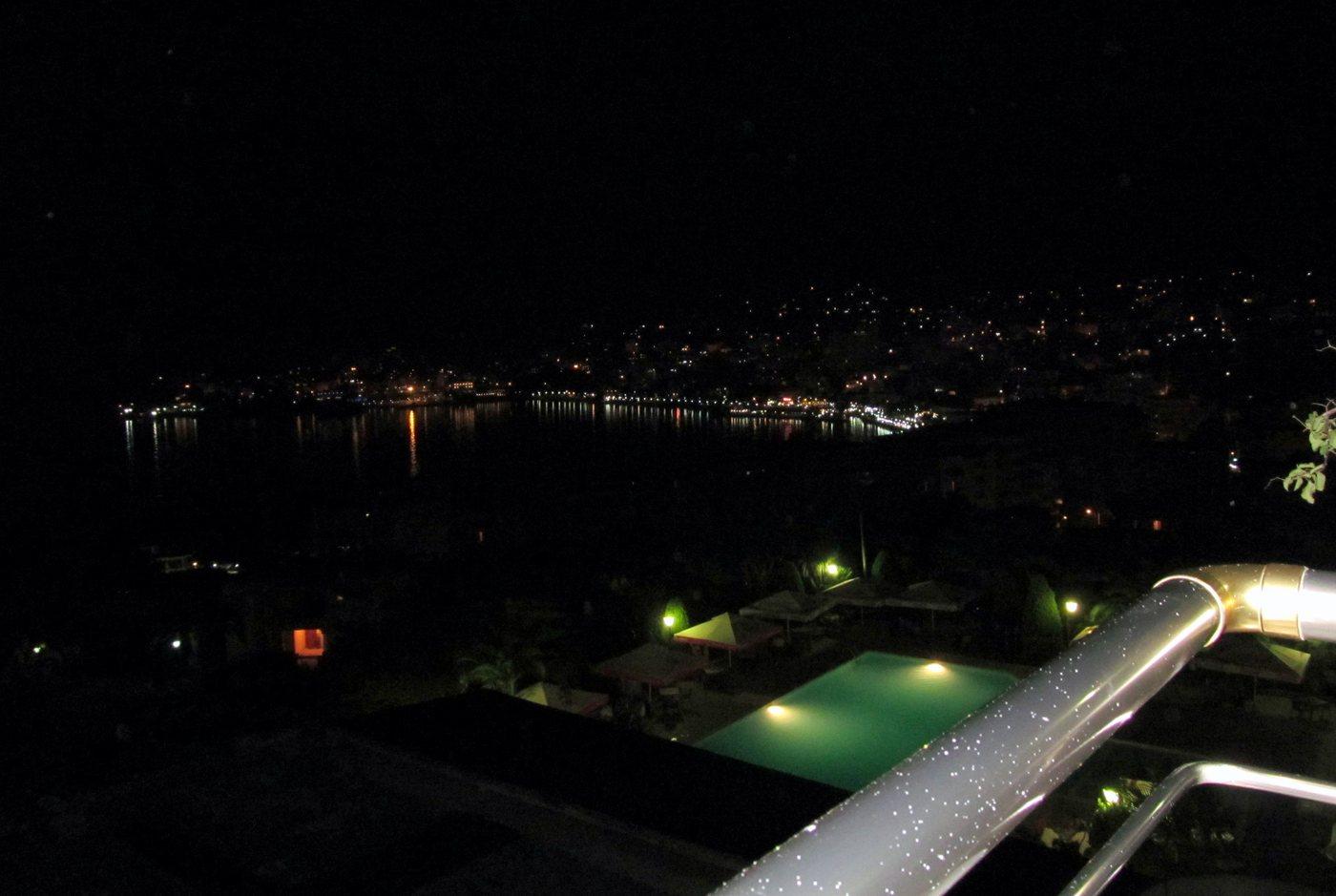 Saranda bay and waterfront restaurants lit up at night, Albania